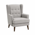 Sillón de tela gris con patas de madera